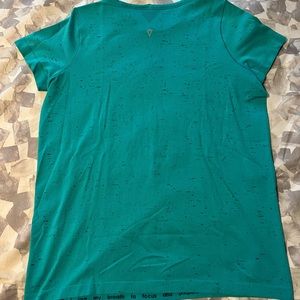 Ivivva by Lululemon athletic short sleeve top. Girls size 14 or woman’s size 2
